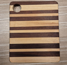 Planche à découper Il Foglio en frêne et iroko - 25x20cm